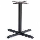 Switch The Durham Medium Cast Iron Table Base is a black commercial table base with a central cylindrical column and cruciform base, designed to support a tabletop. 1 image