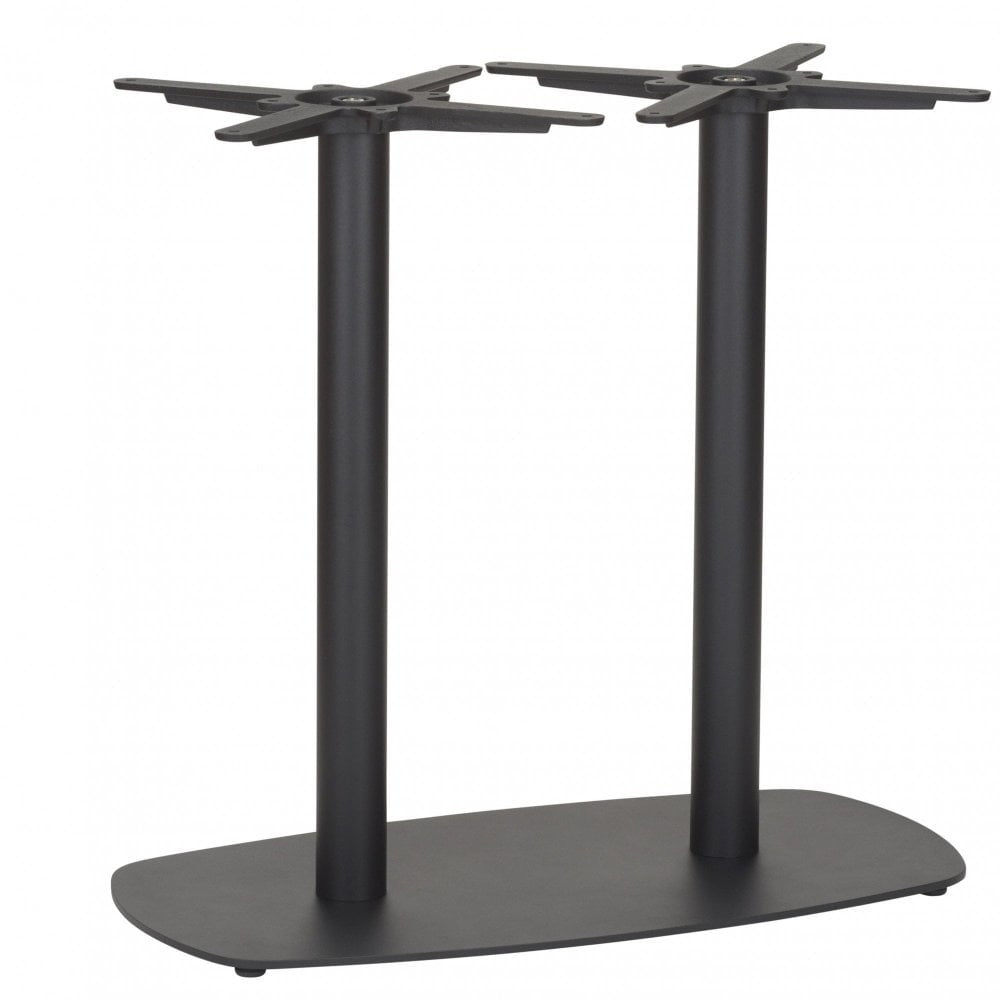 The Vega Twin Pedestal Rectangle Cast Iron Table Base features two cylindrical black metal supports on a rectangular base, with cross-shaped mounting plates for securely holding large tabletops—ideal for commercial interior spaces.