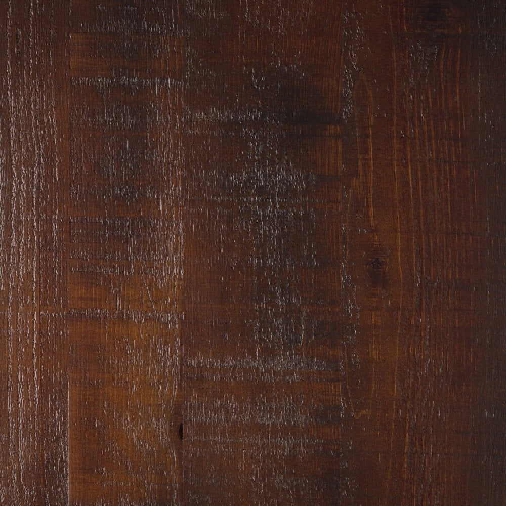 Close-up of the Barrel Pine Solid Wood Table Top - 34mm shows a dark brown surface with visible wood grain, subtle scratches, and natural imperfections, highlighting its rich, warm finish.