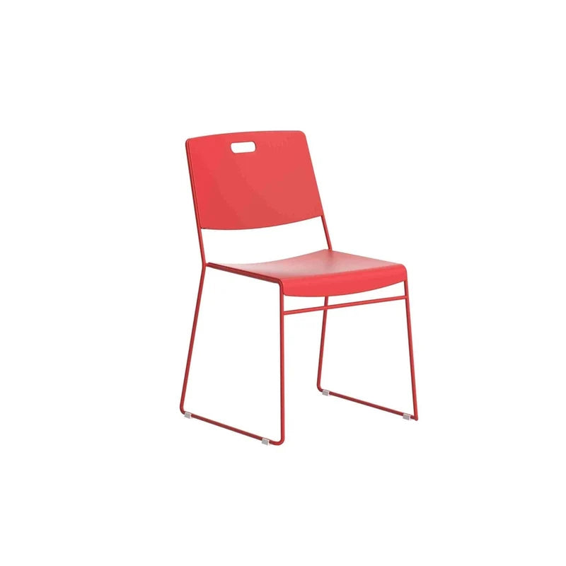 Introducing the Arc High Density Stacking Chair—a modern red chair featuring a durable metal frame, plastic seat and backrest, and a convenient small handle cutout at the top of the back. Highlighting its lightweight construction and contemporary design, the Arc High Density Stacking Chair is displayed facing slightly to the left on a white background.