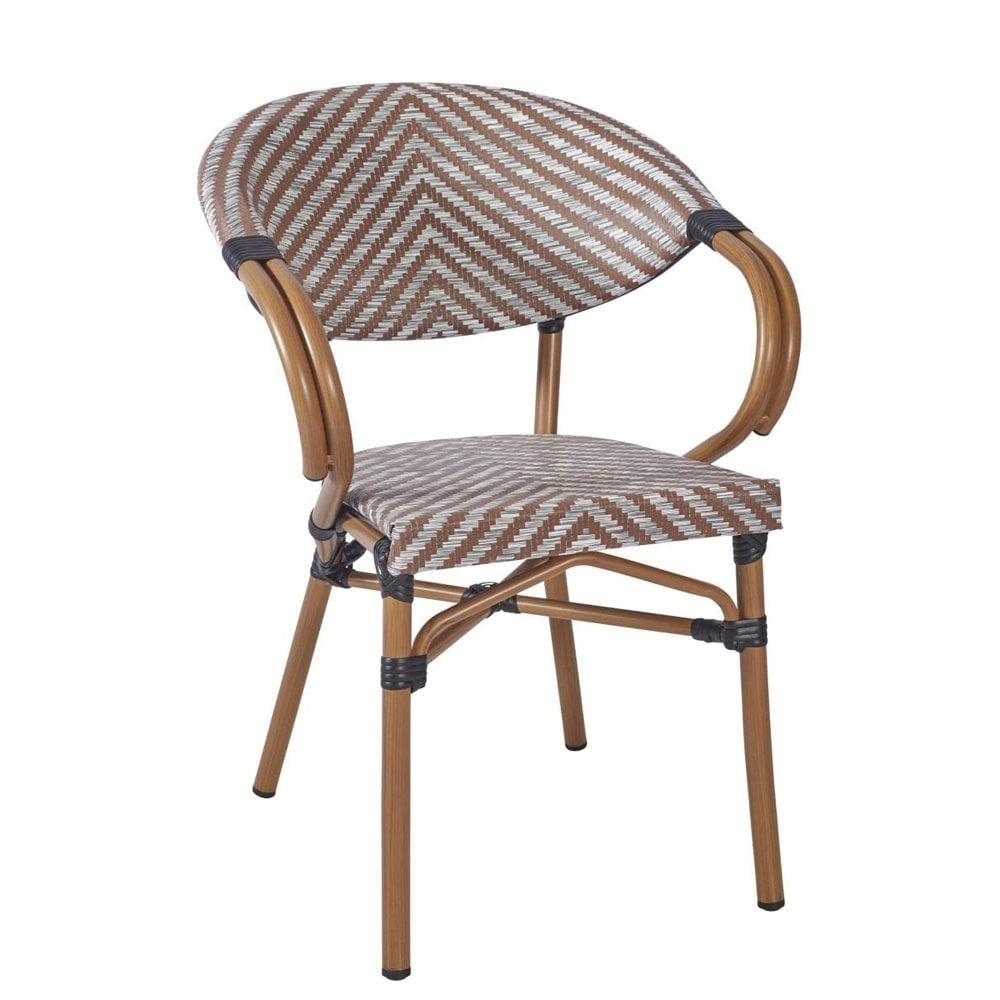 The Montpellier Bistro Outdoor Stacking Rattan Armchair features brown and white chevron weaving, curved wooden armrests, and four sturdy legs—perfect as stylish pub garden furniture.
