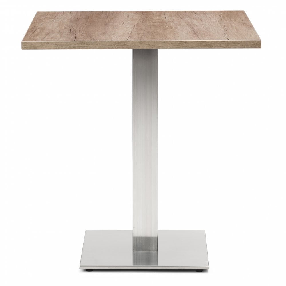 A small, modern square table features a Grey Nebraska Oak Restaurant Table Top (25mm), supported by a single metallic central leg on a flat square metal base, set against a plain white background.