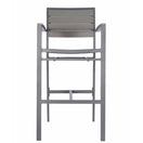 Switch The Villa Outdoor Bar Stool features a tall, minimalist design with a gray aluminum frame, horizontal slatted backrest, and clean lines. It's shown from the front, highlighting its modern outdoor style. 2 image