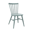 Switch The Spin Retro Outdoor Stacking Side Chair is shown in light blue with a curved spindle backrest, vertical slats, and angled legs against a plain white background. 2 image
