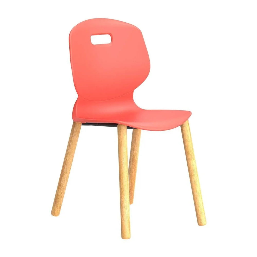 The Titan Arc Wooden Classroom Chair—a red plastic chair with a curved backrest, cutout handle, four light wooden legs, and a sturdy wooden frame—is shown against a white background, making it ideal for educational seating.