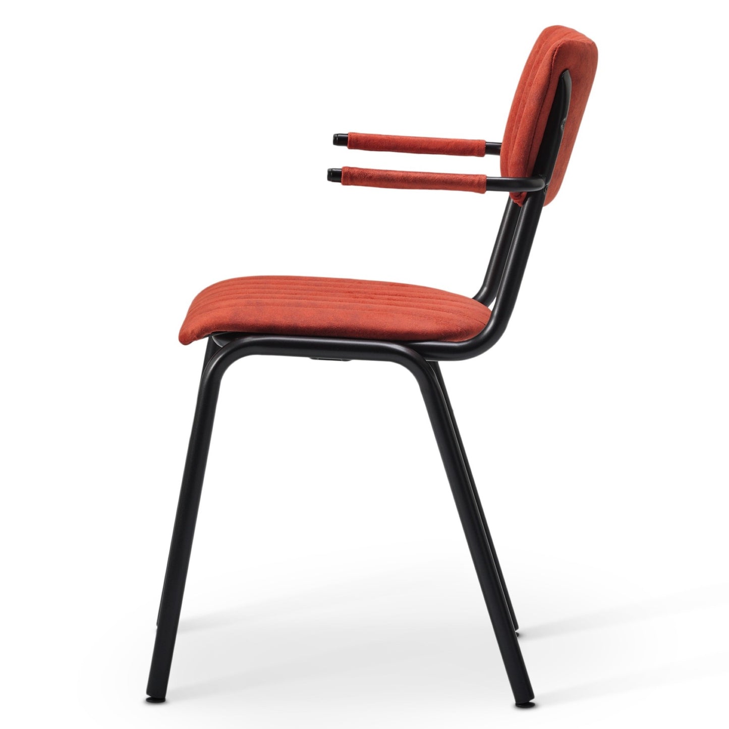 The Derby Industrial Armchair features a black metal frame with parallel bar armrests and is upholstered in red faux suede with a padded seat and backrest, shown in side view against a white background.