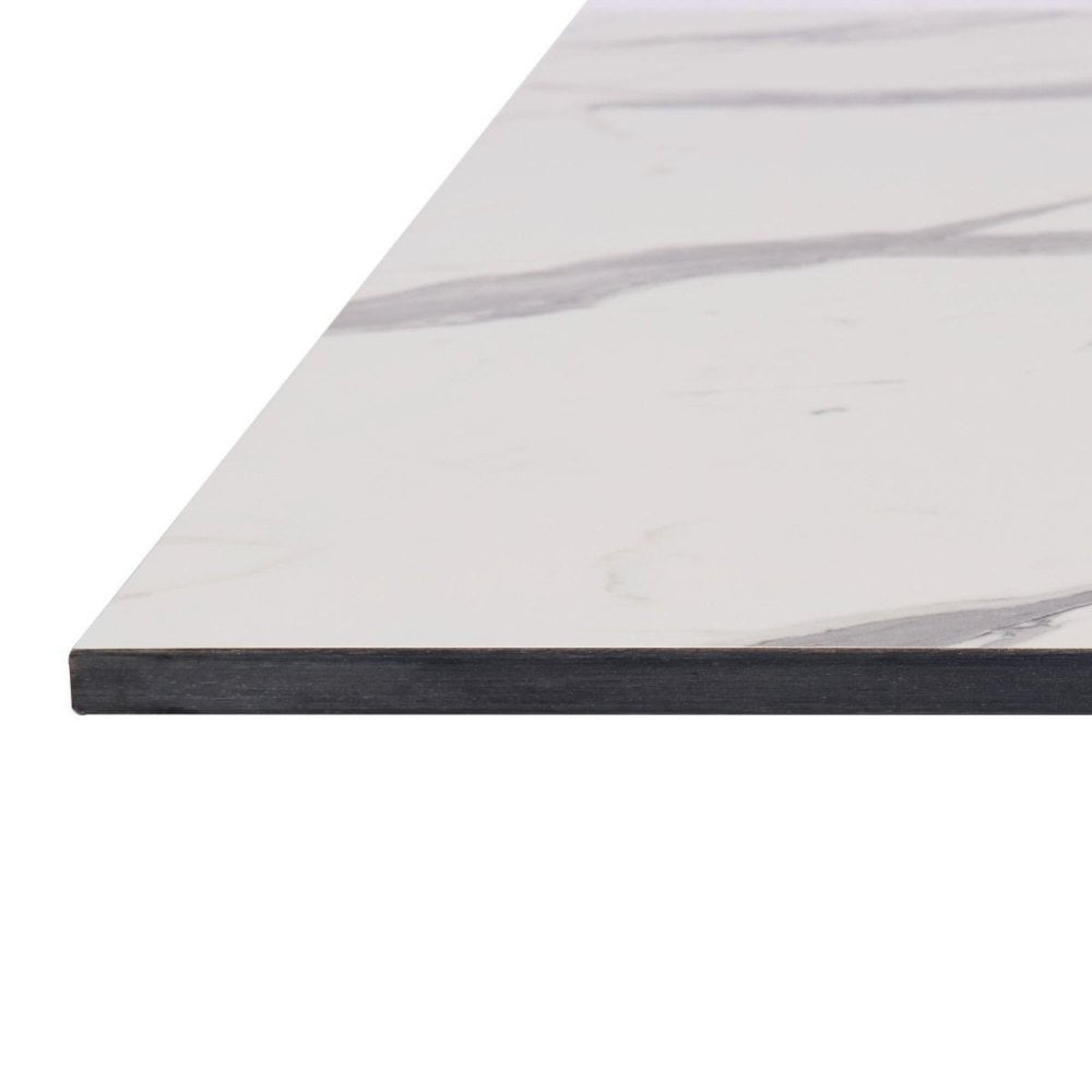 A close-up side view of the White Carrara Marble Outdoor Laminate Restaurant Table Top, 12mm thick, featuring a thin, rectangular shape with a white surface and gray veining that resembles marble, shown against a white background.