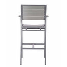 Switch The Villa Outdoor Bar Stool features a tall gray aluminum frame and a horizontal slat backrest, shown from behind. The seat and backrest are crafted from wood or composite materials for outdoor durability. 3 image