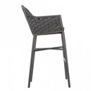 Switch The Cordoba Outdoor Bar Stool features a high backrest with a woven dark gray seat and back, set on four slim, angled aluminum legs. Weather-resistant, it is shown from the side against a white background. 3 image