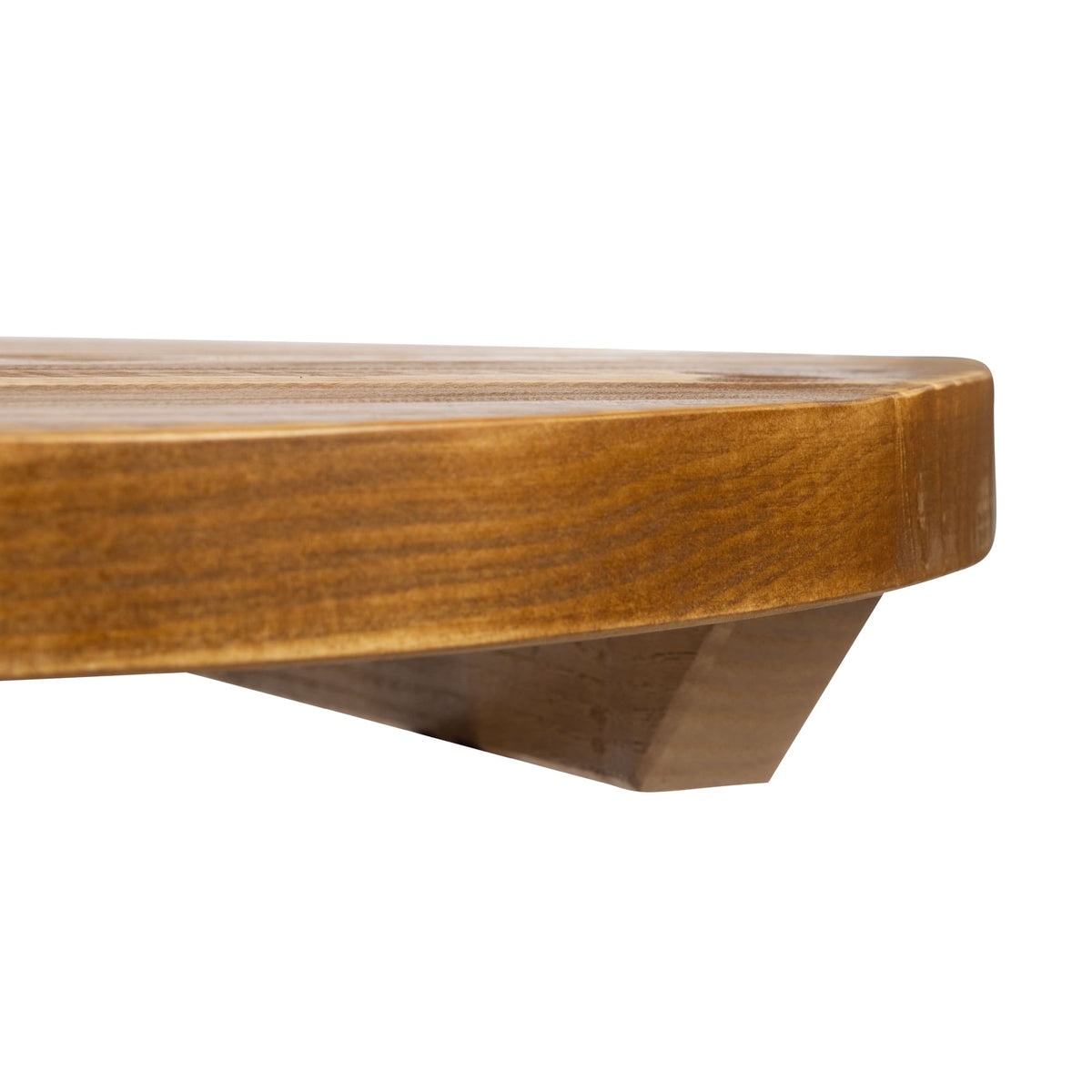 A close-up of the Rustic Pine Restaurant Table Top - 32mm with rounded edges, shown resting on a small angled leg. The pine surface has a smooth, polished finish reminiscent of high-quality hospitality table tops, set against a plain white background.