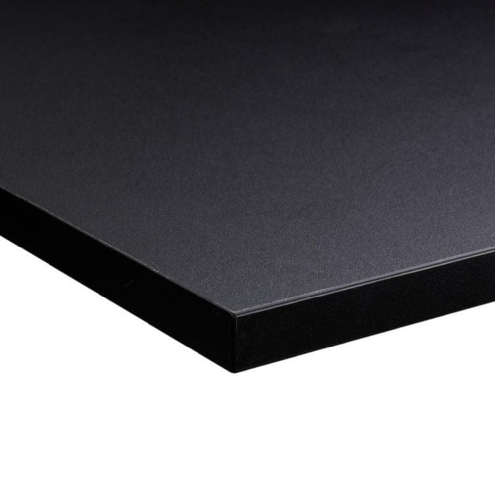A close-up of the Bengal Black Restaurant Table Top - 25mm shows its black, rectangular, matte surface against a white background—perfect for durable table tops in modern spaces.