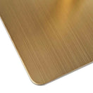 Switch A close-up of the Zeus Square Brass Table Base - Large shows its brushed gold metal with rounded corners, smooth surface, and fine linear texture—perfect for achieving an elegant brass table base look. 2 image