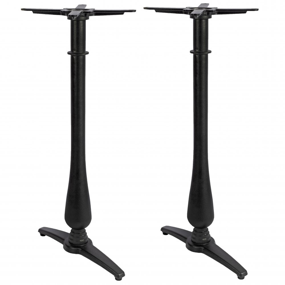 The Manor Twin Leg Pedestal Candelabra Black Cast Iron Table Base features two elegant black pedestals with wide, sturdy feet and vertical columns, displayed side by side on a white background for a refined look.