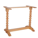 Switch A light natural wood table stand with turned beaded legs and a top support bar, shown on a plain white background. 3 image